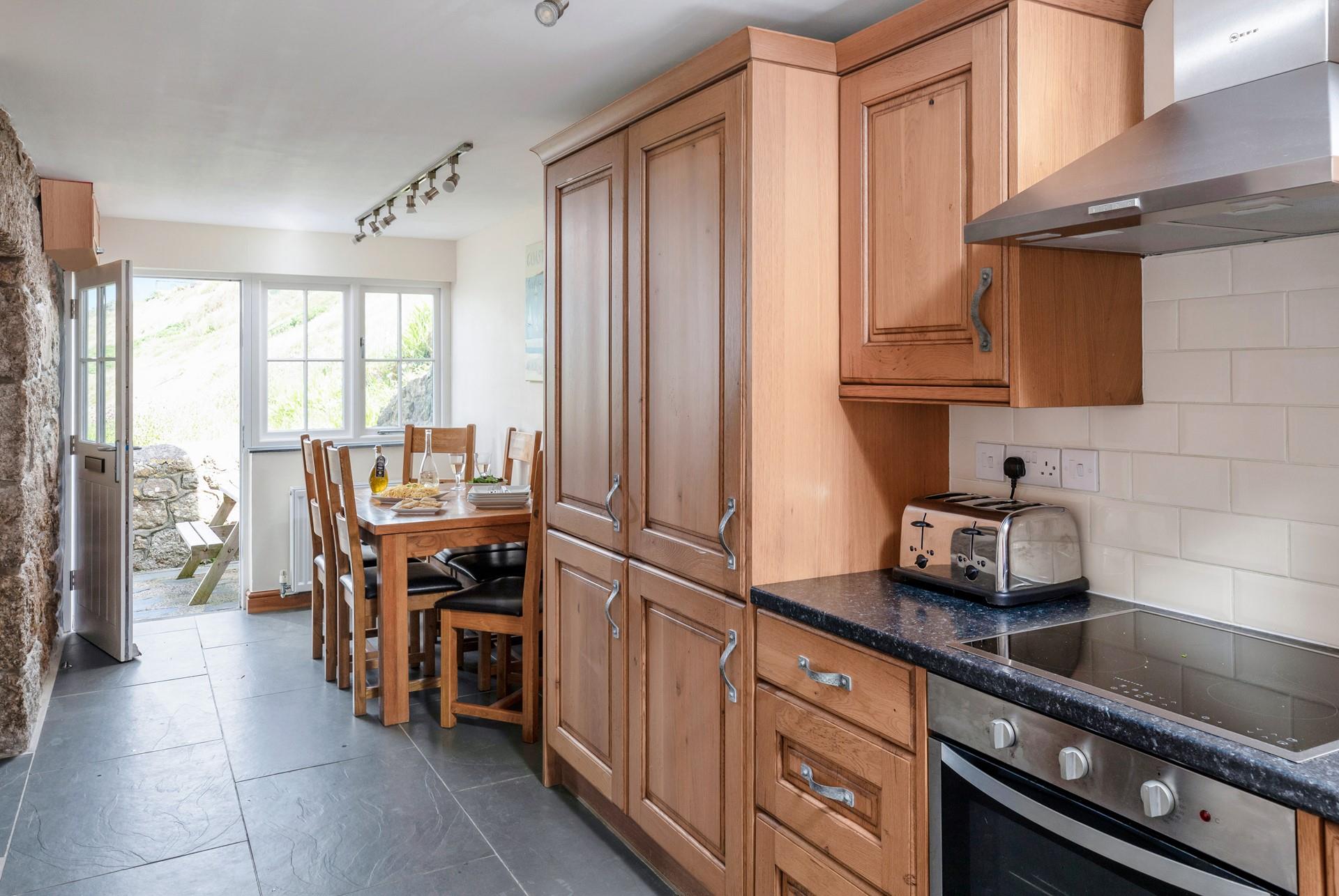 Kitchen amenities include a fridge, freezer, and dishwasher!