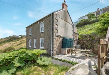 A traditional granite cottage just five minutes walk from the beach.