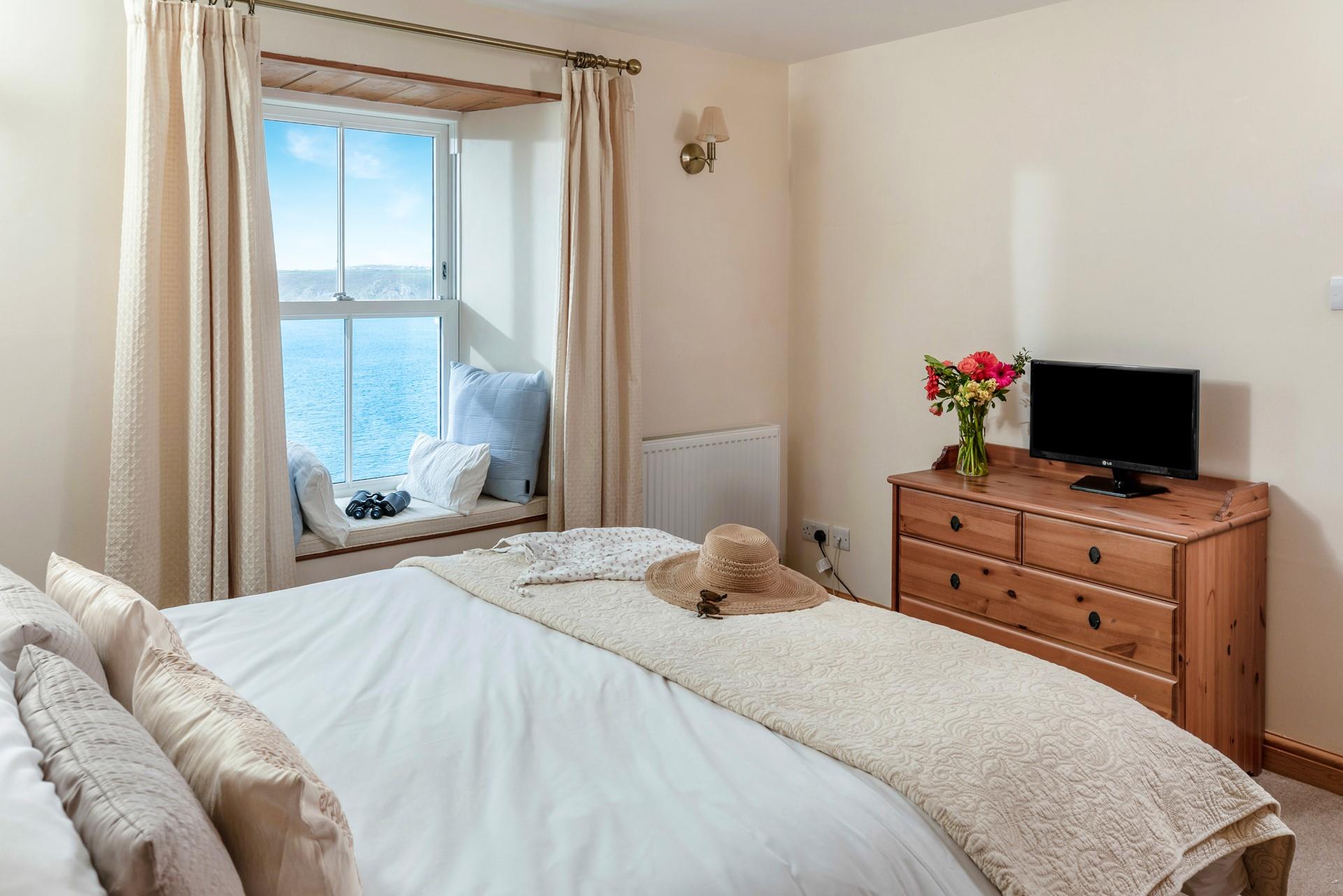 Idyllic coastal seascapes surround the cottage.