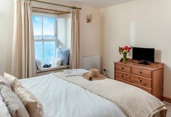 Idyllic coastal seascapes surround the cottage.
