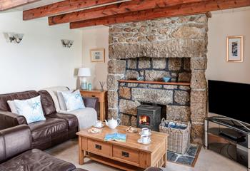 Cosy up in front of the woodburner on milder evenings.