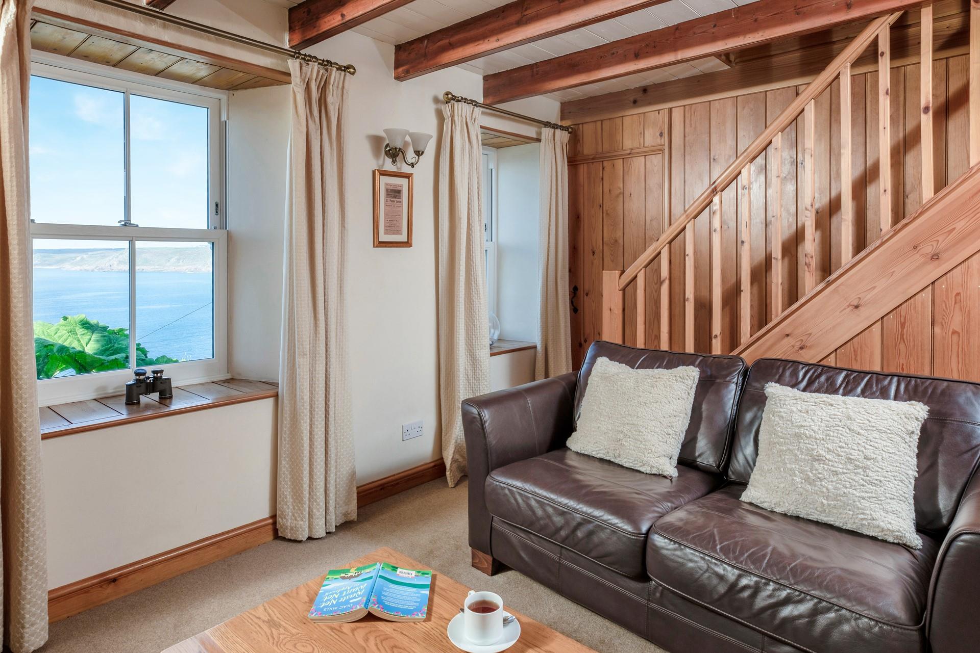 Natural wood interiors create a nautical feel in the cottage.