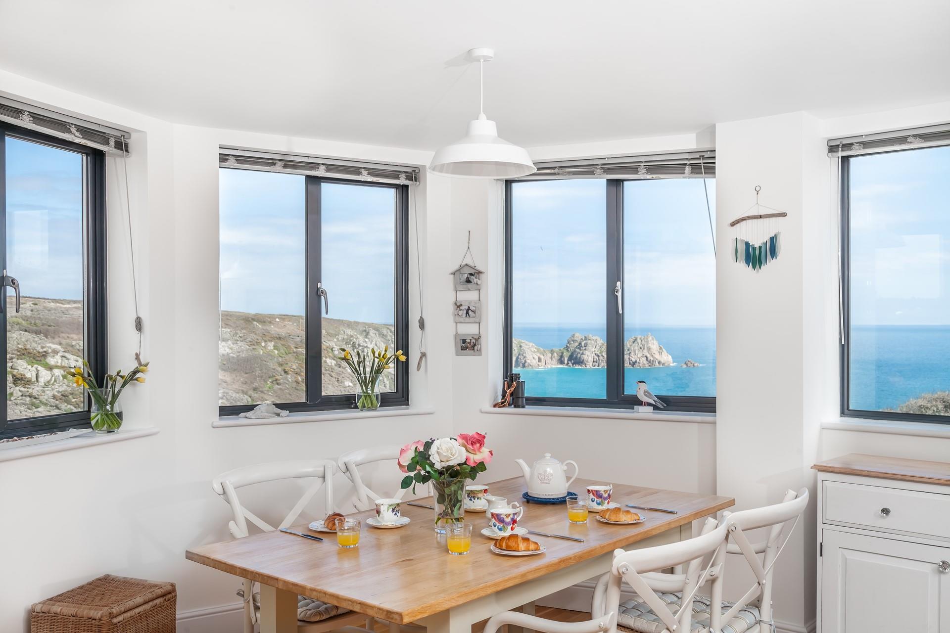 Enjoy a family breakfast surrounded by this stunning Cornish sea view.