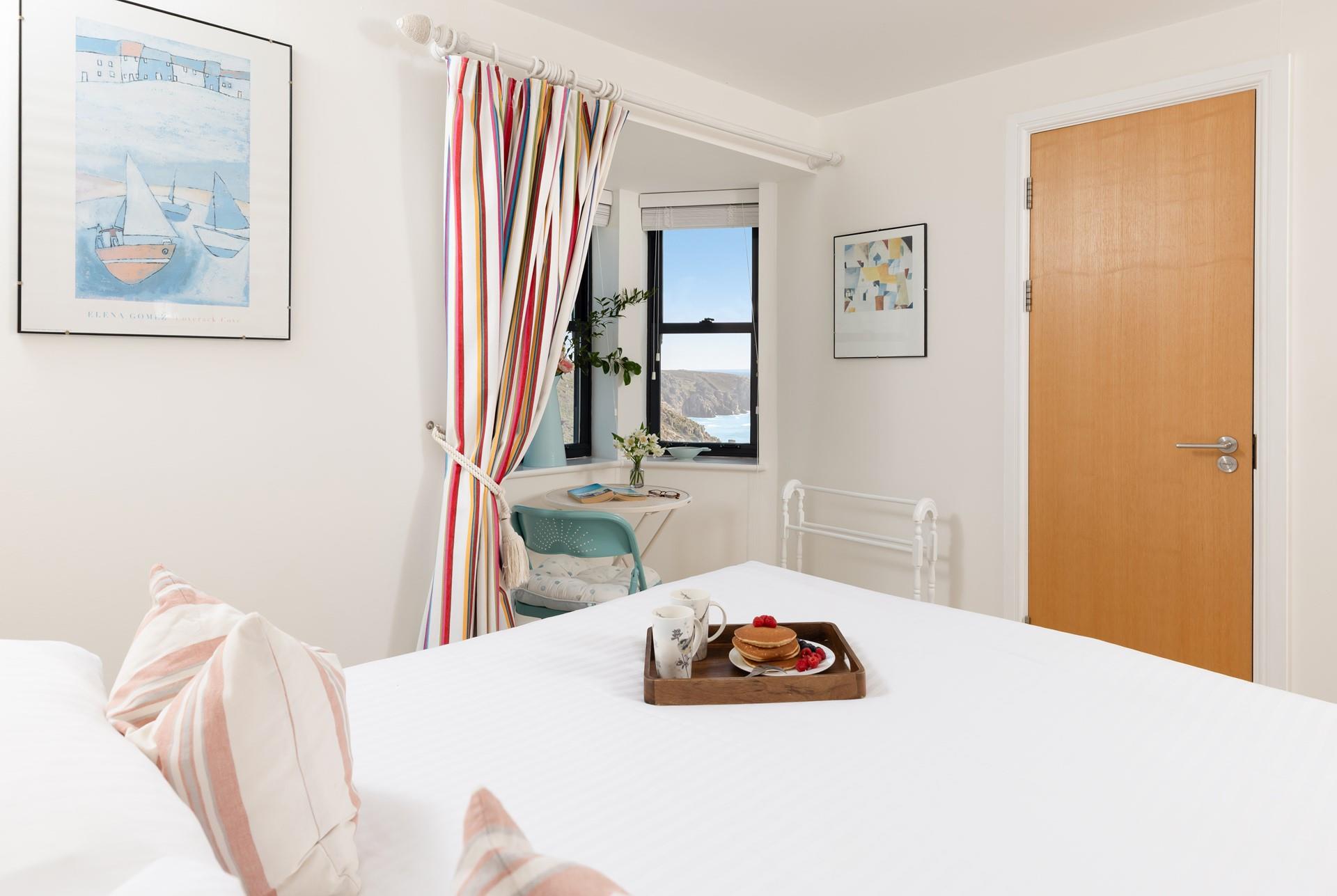 Wake up slowly to views of the ocean in bedroom 1. 
