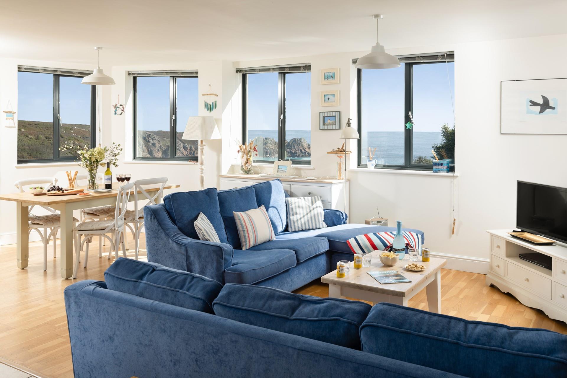 Natural light pours through the windows of Ocean View 2's living, dining and kitchen area. 