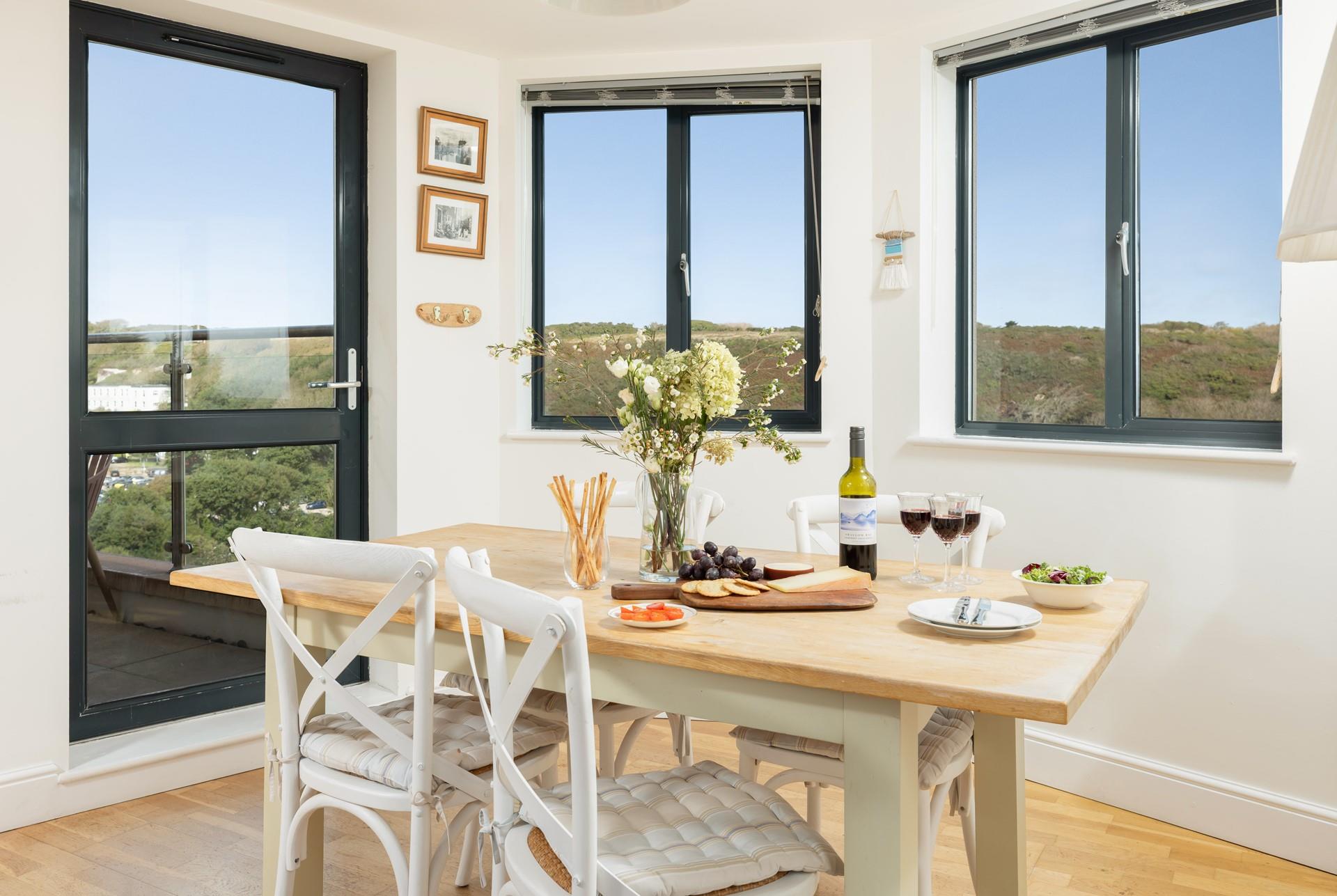 Gather around the table and enjoy a delicious meal together. 
