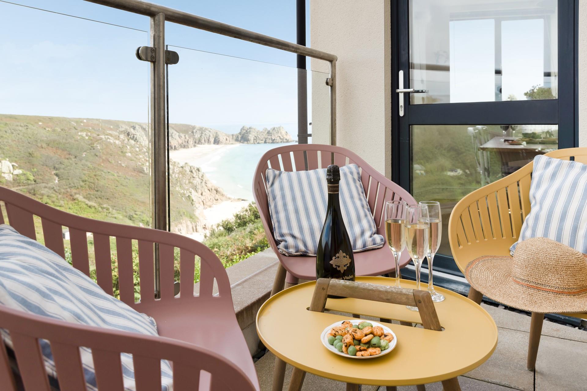 The balcony overlooks the stunning Porthcurno beach. 