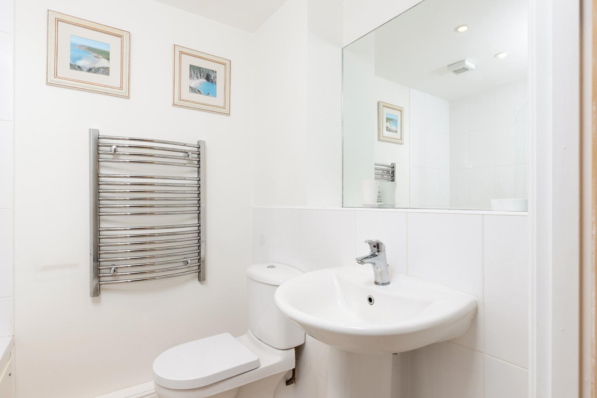 The family bathroom is the perfect place to get ready for the day. 