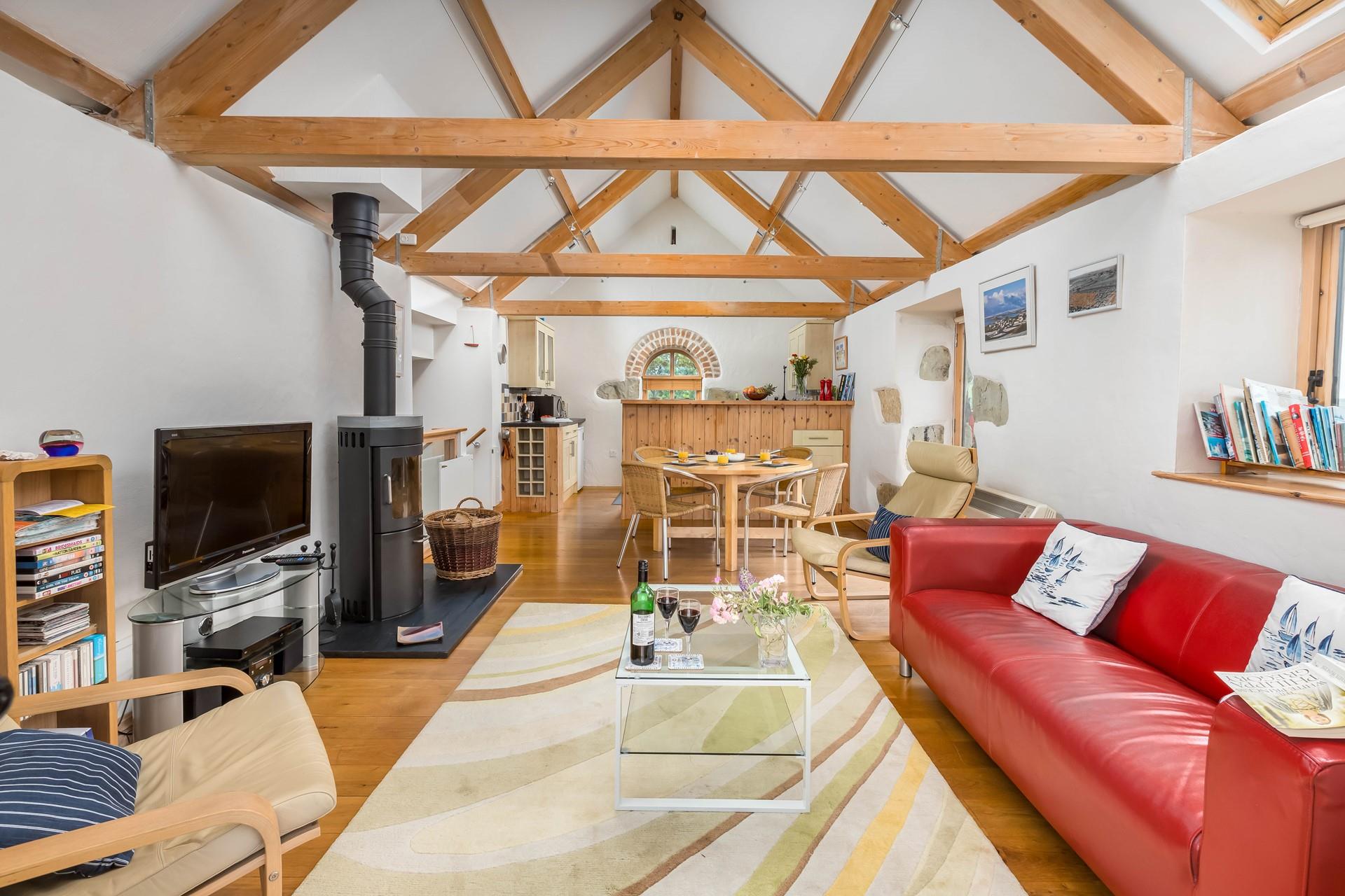 The open plan living area is spacious and light and provides space for the whole family.