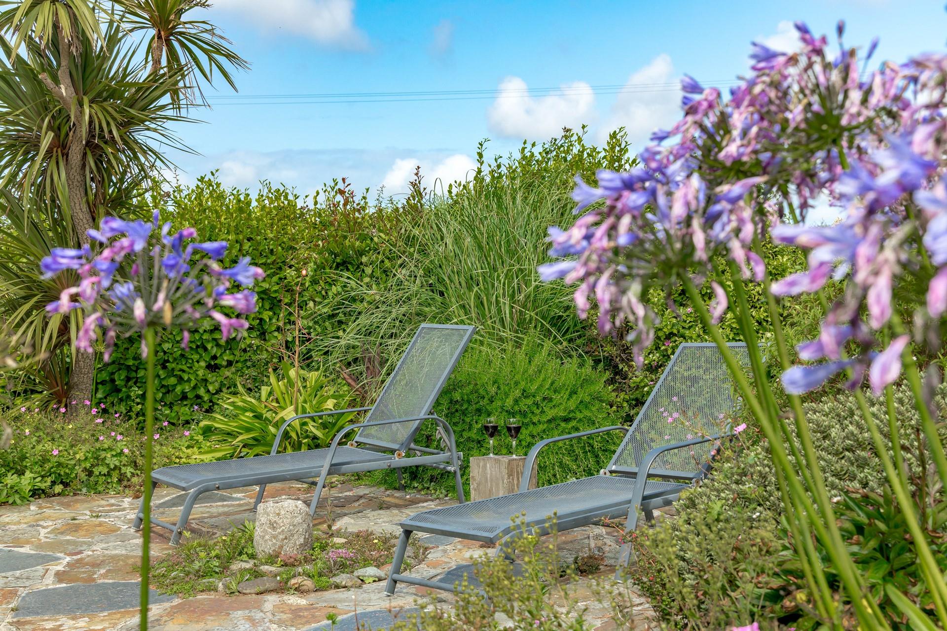 Lie on your lounger with your favourite tipple and unwind from daily life.