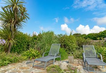 Relax on the sun loungers and soak up the sun.