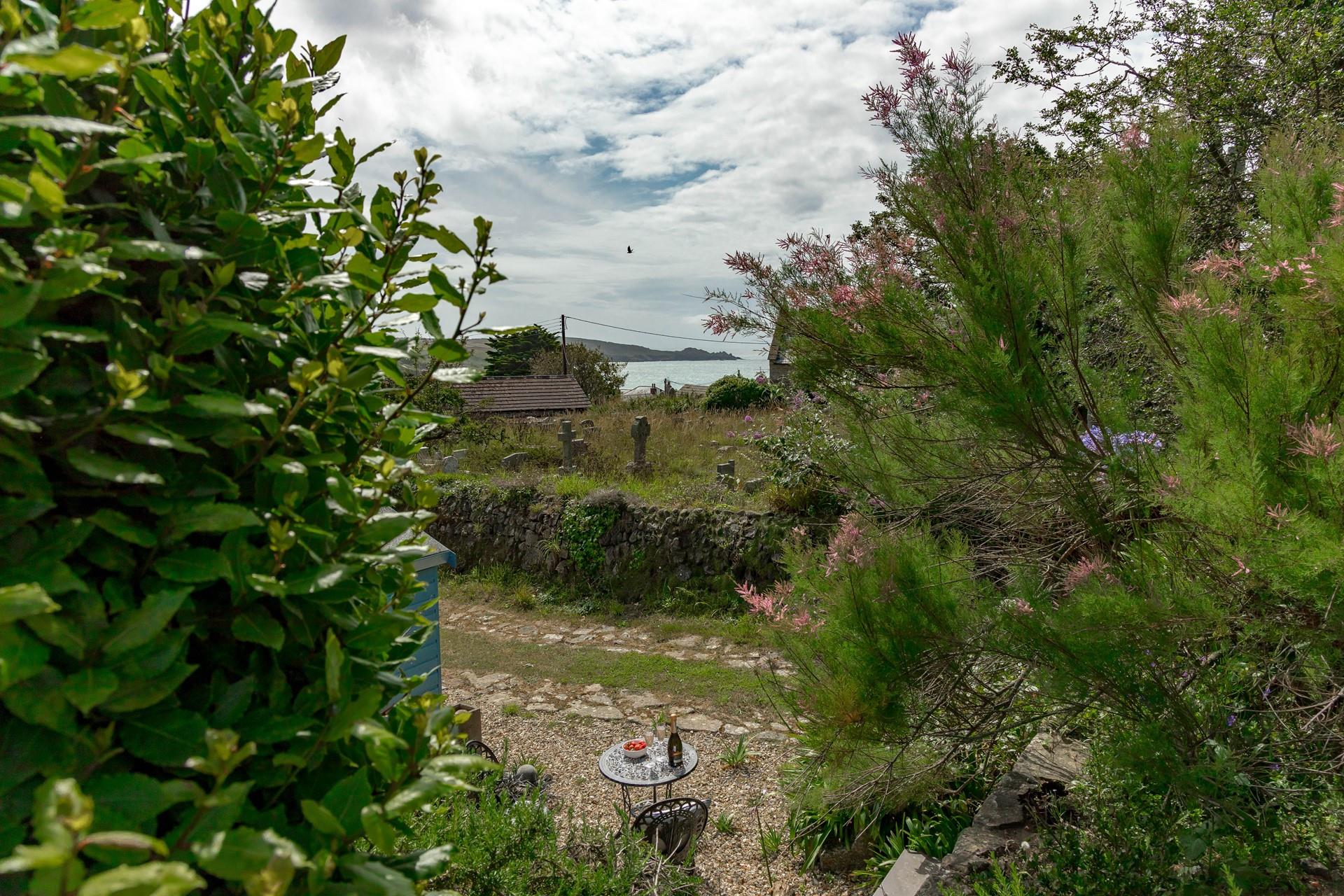 Spend time in the garden gazing out at the sea views.