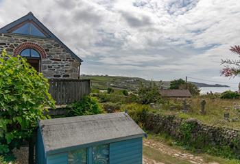 Walk the cliff path, discover the Cornish coastline and come back to put your feet up in the garden.