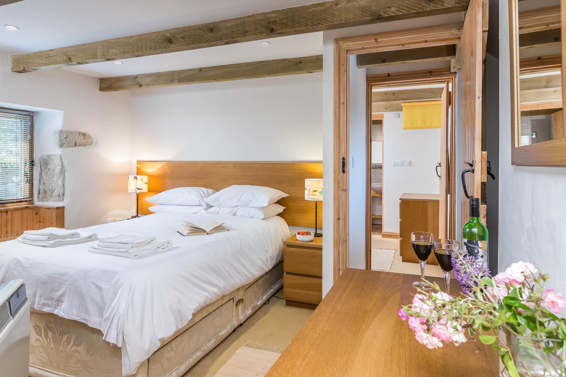 Retire to your spacious king size bed after spending the evening in the garden.