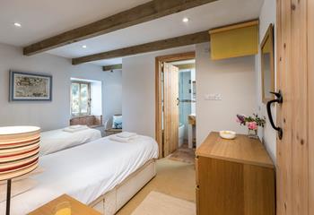 The twin beds are the perfect space to relax after busy days in the sun.
