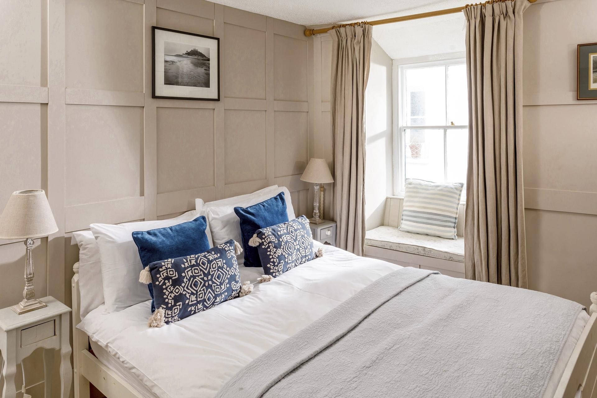 Bedroom 3 is another double room, a bright and inviting space to fully relax on your holiday.