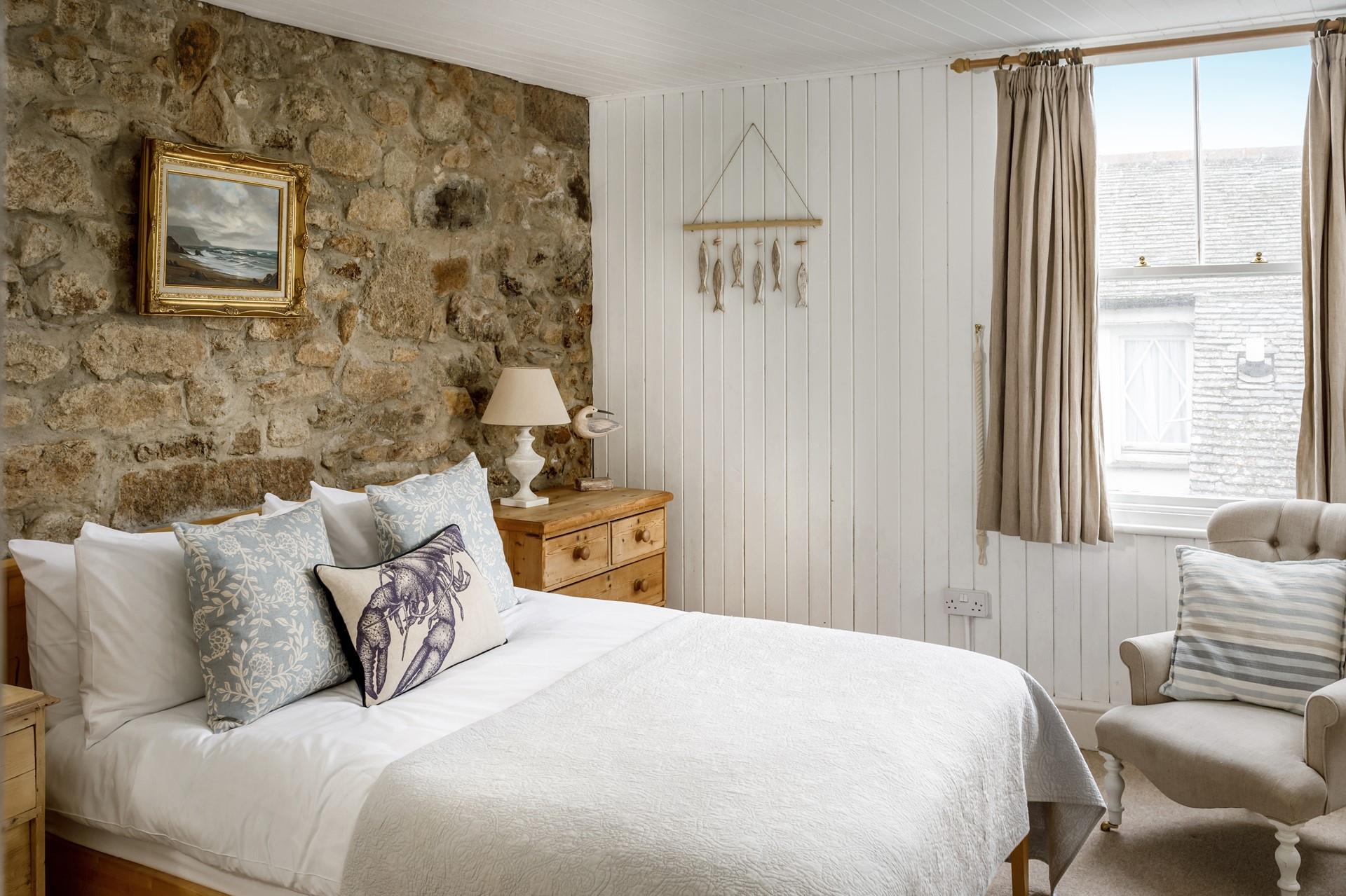 Sink into the sumptuous soft sheets of the double bed and drift off into a dreamy night's sleep.