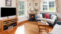 Snuggle up in front of the fire after tucking into a delicious dinner.