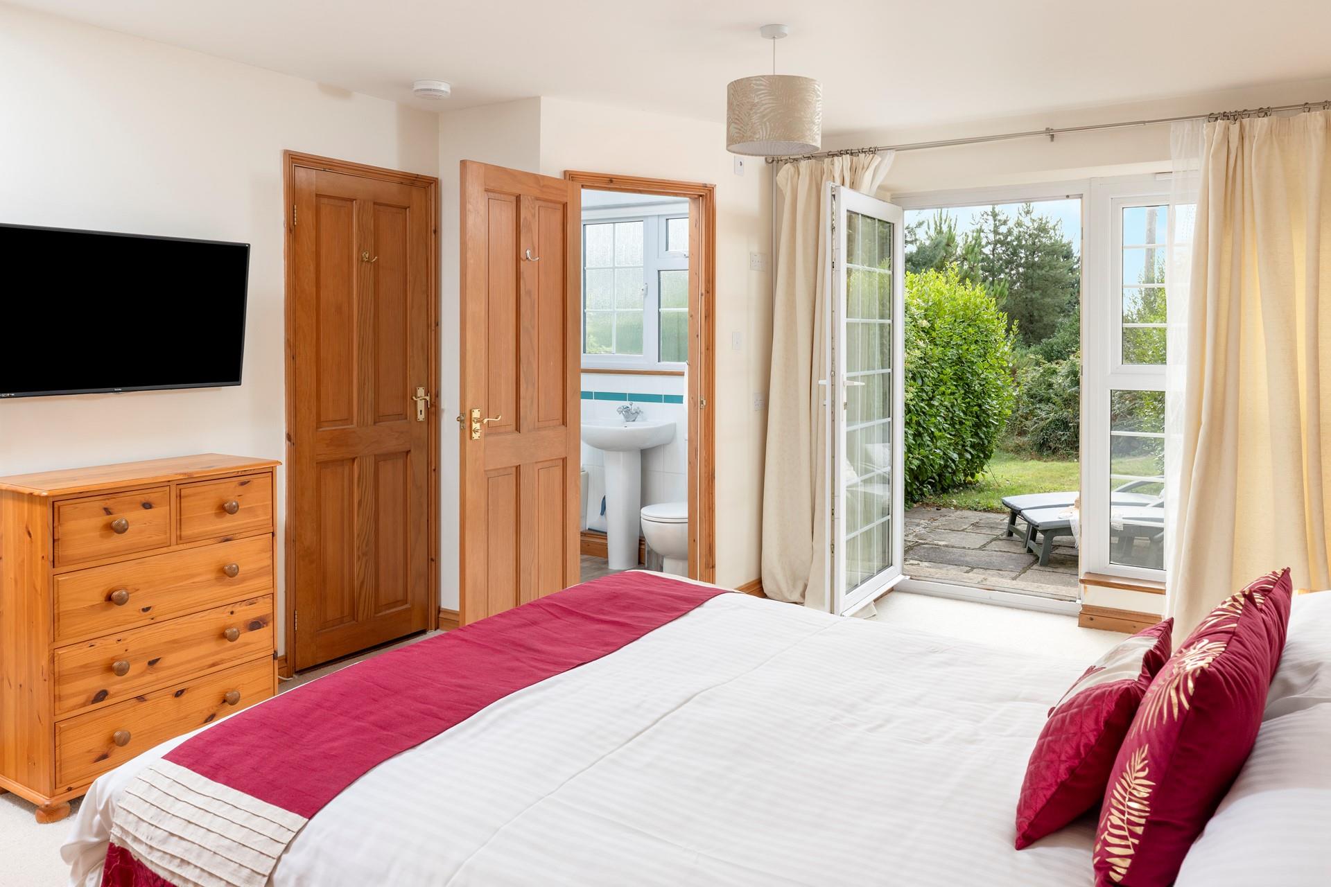 The master bedroom has patio doors leading out onto a sun terrace, the perfect place to sip your morning cuppa.