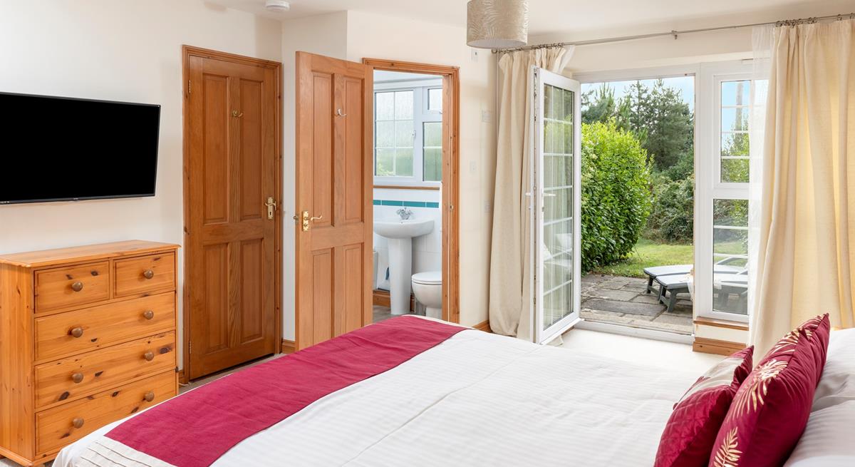 The master bedroom has patio doors leading out onto a sun terrace, the perfect place to sip your morning cuppa.