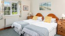 The spacious 2nd bedroom can be made up with twin beds or a super king. 