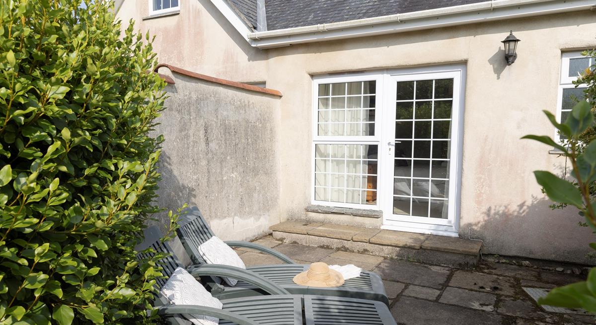 Sunbathe on the terrace on a warm summer afternoon after a morning stroll to the cove.