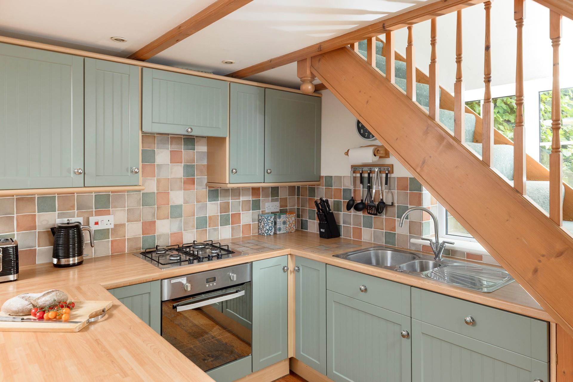 The family foodie will love to cook in the country-style kitchen.