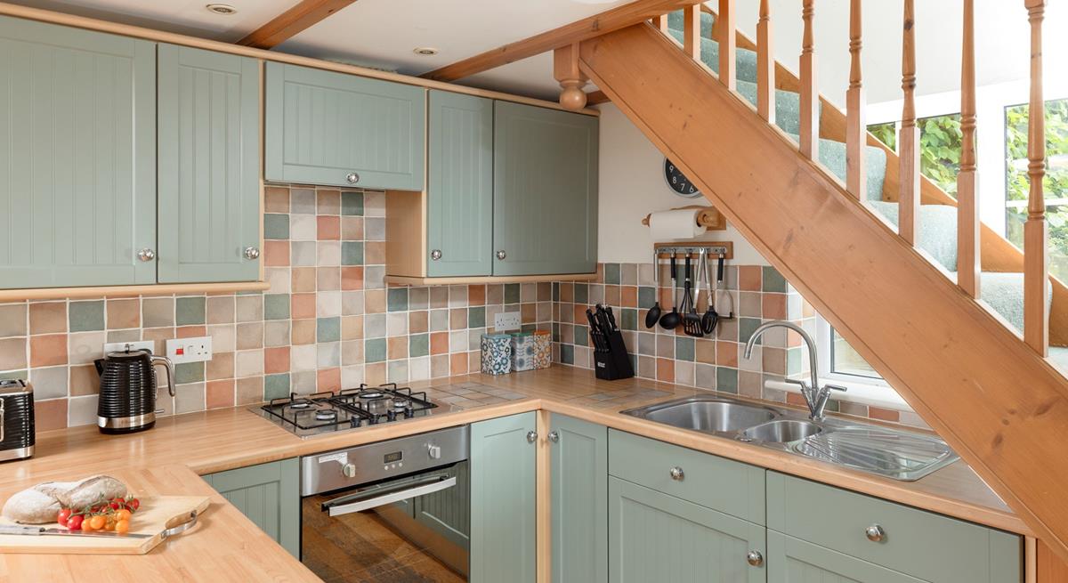 The family foodie will love to cook in the country-style kitchen.