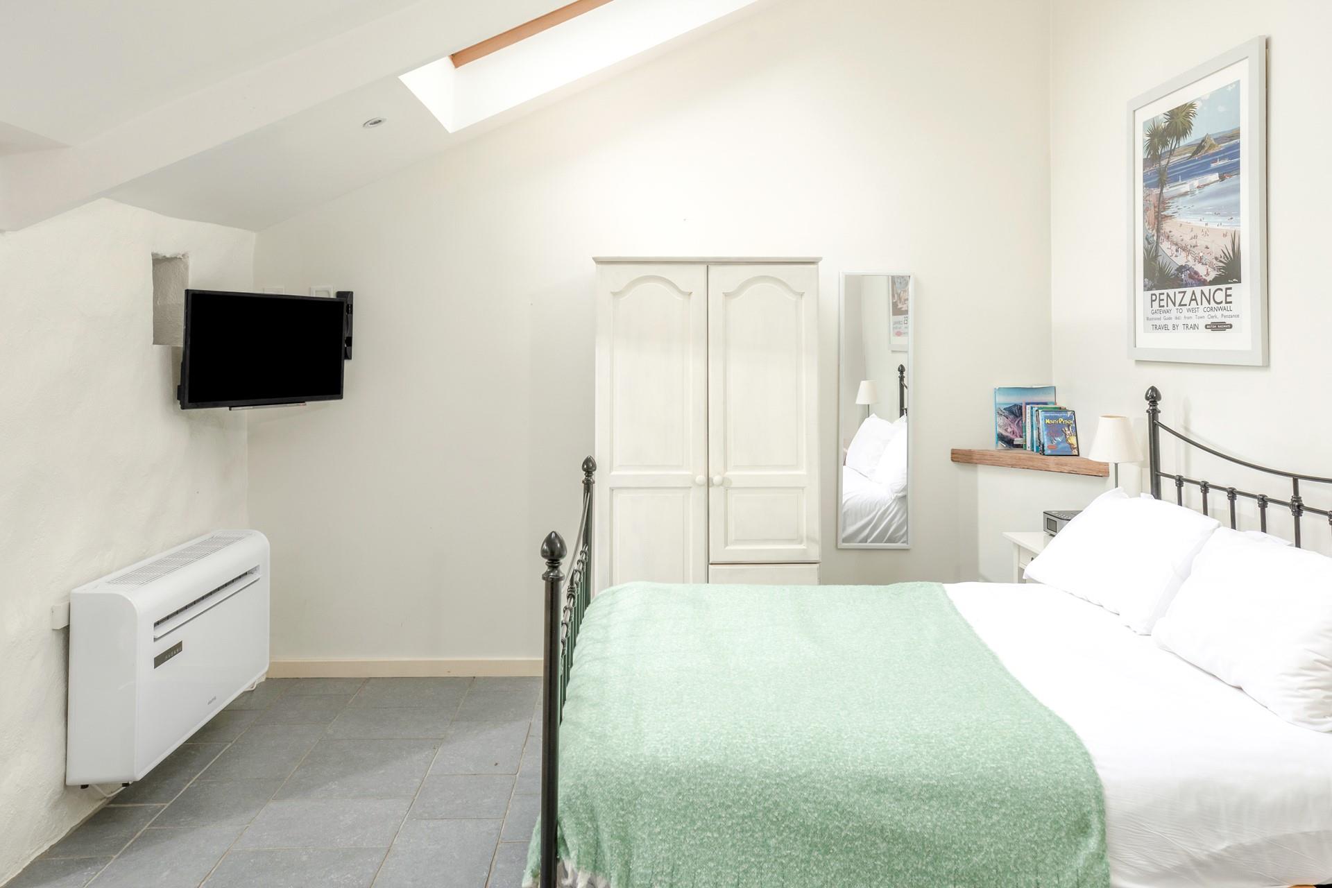 Discover hidden gems on the coast path with this cosy base to return to.