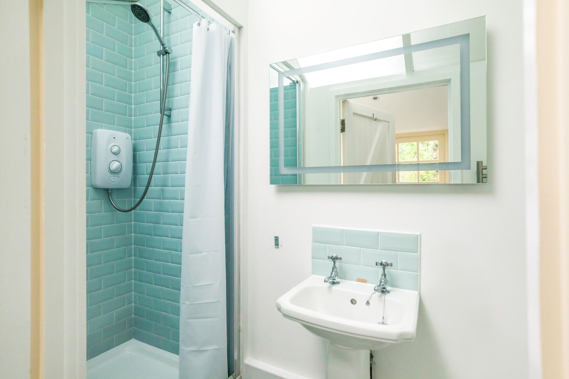 Freshen up in the spacious walk-in shower. 