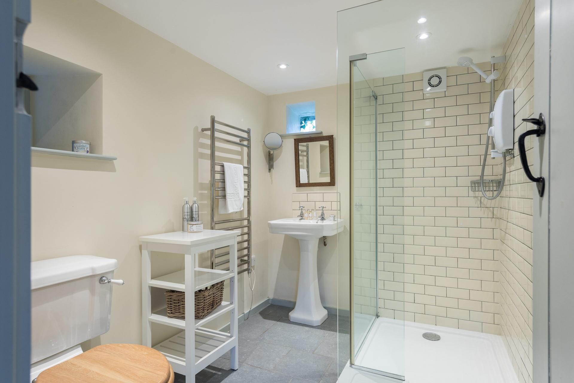 The beautiful bathroom is a dream to shower in.