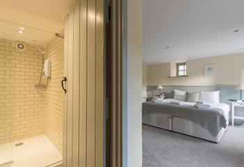 The bedroom is on the ground floor, with an en suite shower room. 