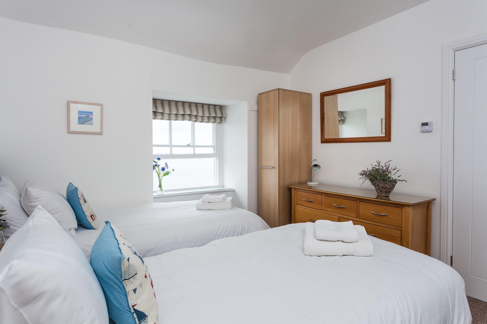 Soft fluffy towels await you after an invigorating morning shower.