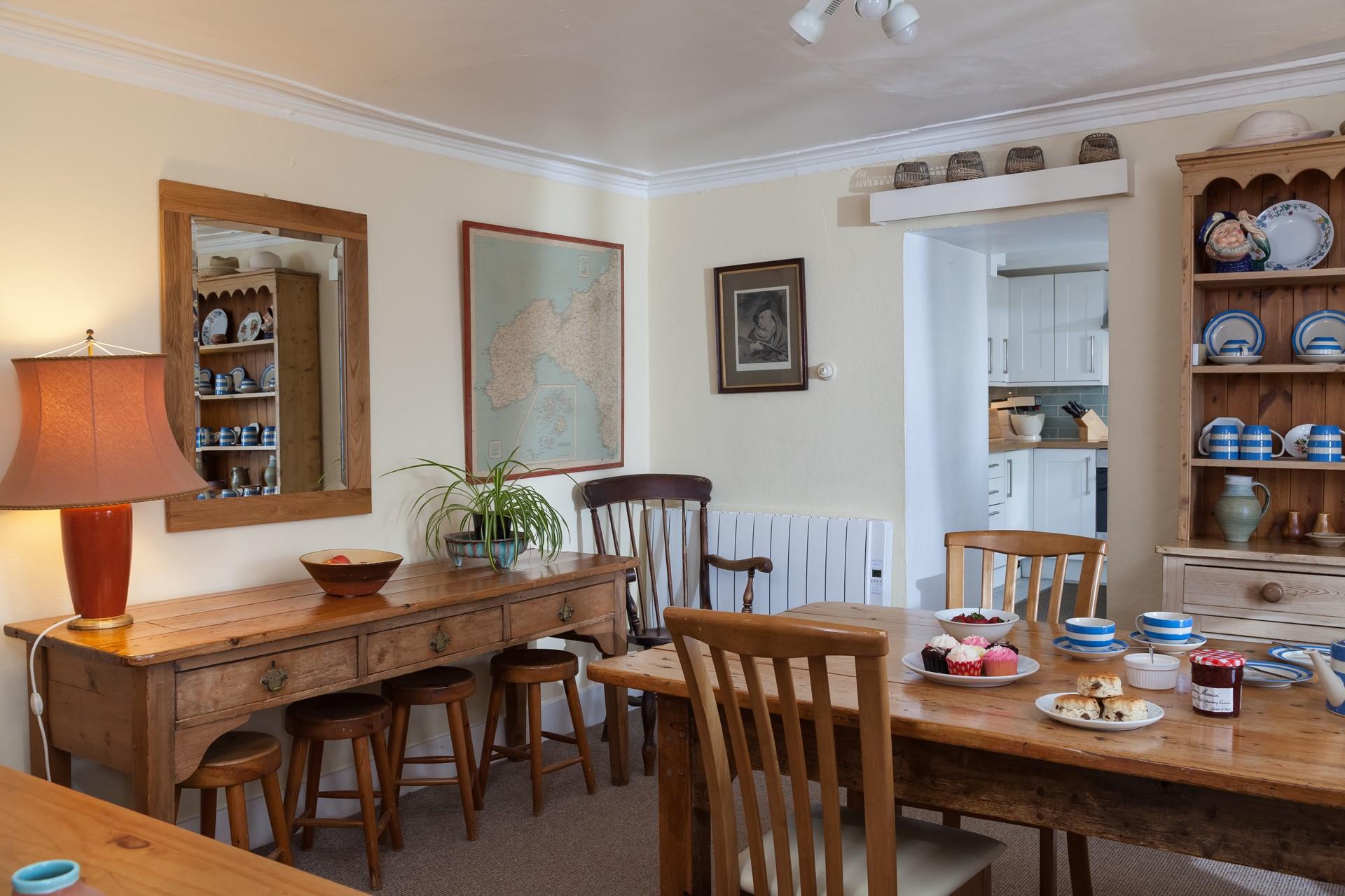 The dining room has plenty of seating space for enjoying meals together.