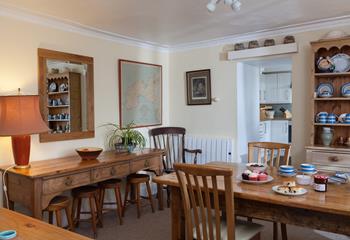 The dining room has plenty of seating space for enjoying meals together.
