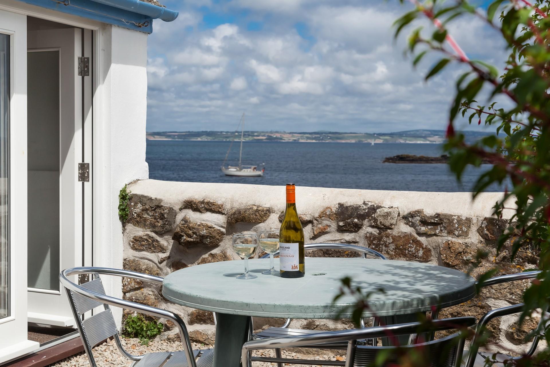 Open a bottle of wine to sip in the evening sunshine.