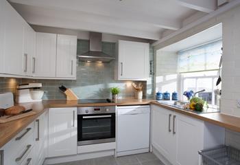 The kitchen area is well-equipped, with all you need to holiday with ease.