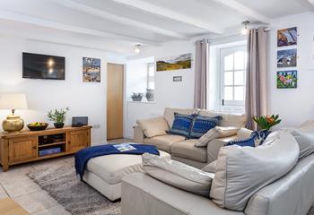 The sitting room is a cosy base to come back after exploring St Ives.