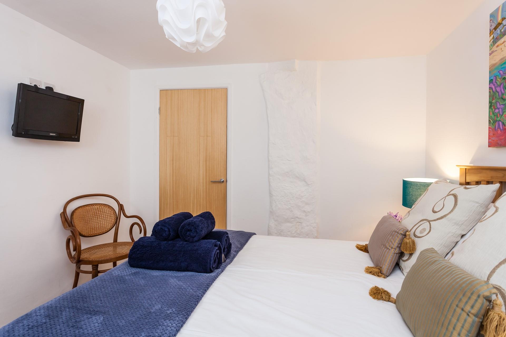 Spend cosy evenings watching your favourite film on the TV in the spacious double bed.