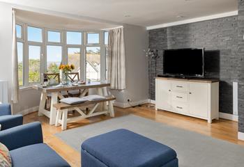 Open plan living and dining make the most of the view.