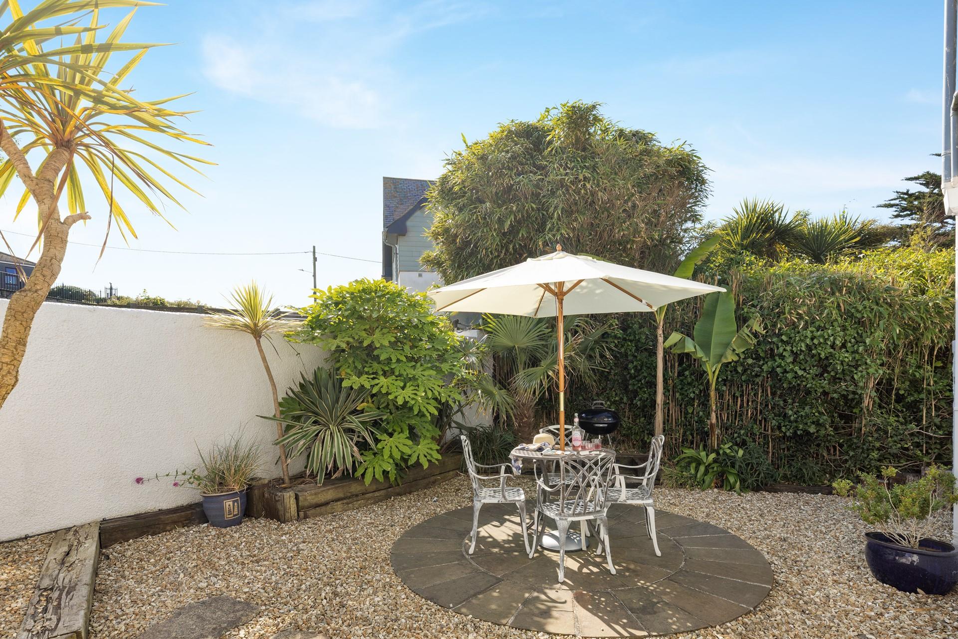 The courtyard is a lovely suntrap, perfect for alfresco dining.