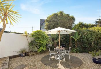 The courtyard is a lovely suntrap, perfect for alfresco dining.