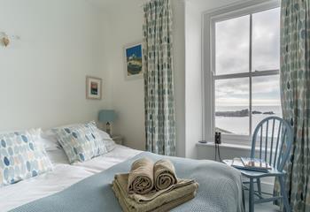 Relax in the window seat looking over the Cornish sea views. 