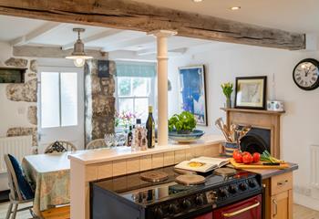 Exposed wooden beams add character to this delightful Cornish cottage.