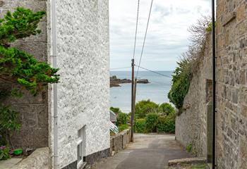 Stroll down the lane down the side of the property to Mousehole harbour. 