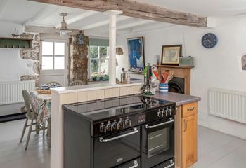 Exposed wooden beams add character to this delightful Cornish cottage.