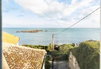 Stroll down the lane down the side of the property to Mousehole harbour. 