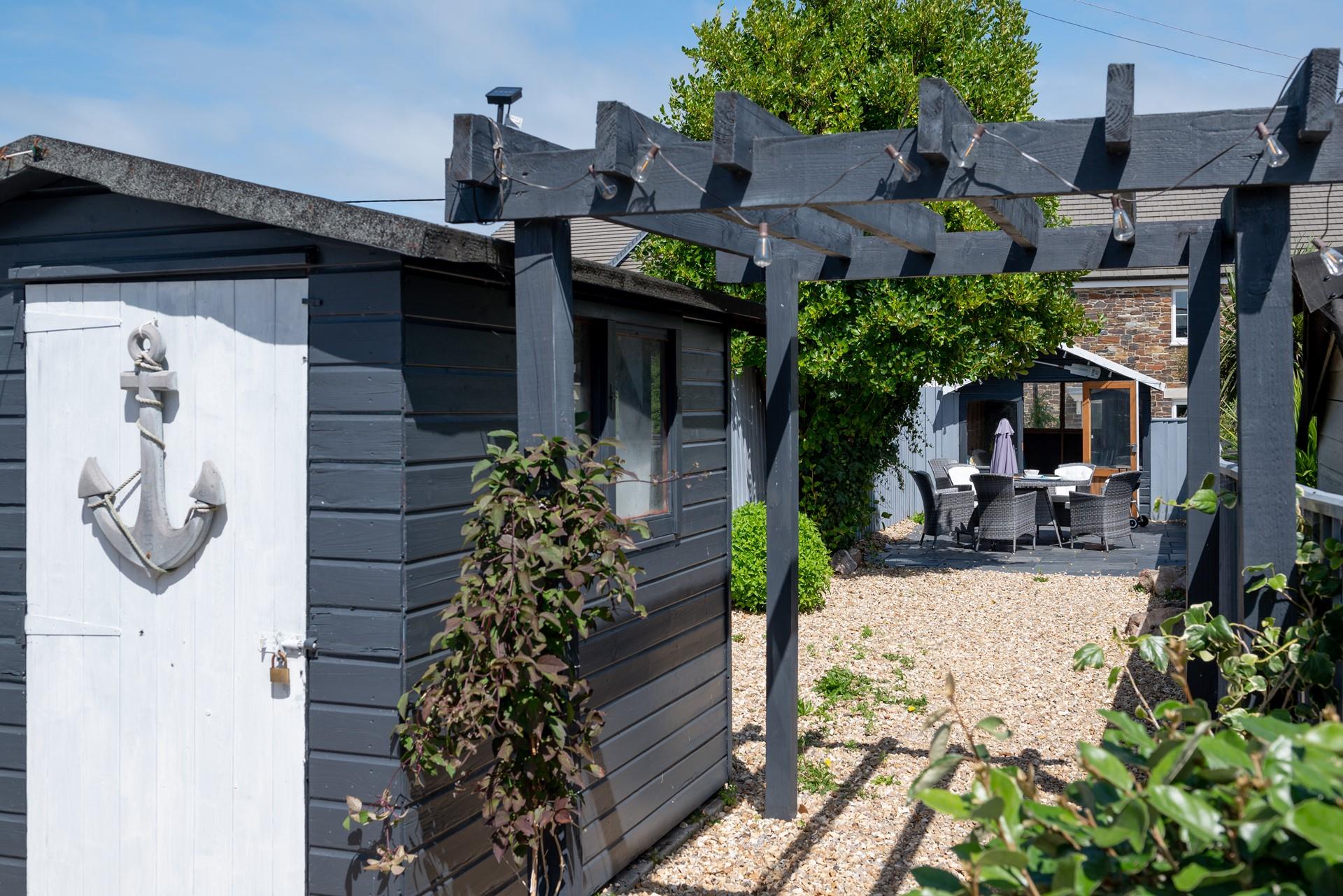 Relax in the sun trap outdoor area with a glass of wine and really sink into holiday mode. 