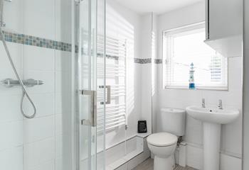 After a day at the nearby beach, Porthkidney Sands, wash off the sand in your corner shower. 