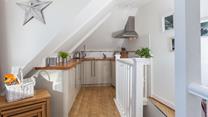 Buy some fresh ingredients to cook up a delicious romantic meal.